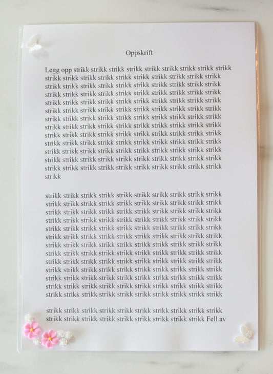 Oppskriftshefte med rosa blomster
